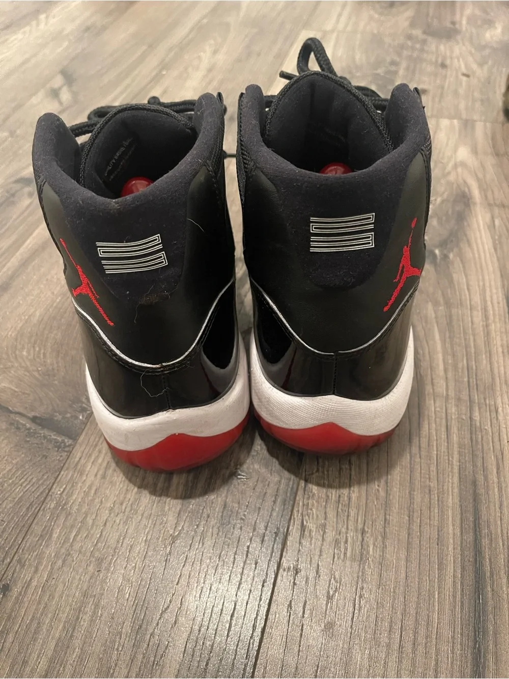 Jordan Bred 11s Retro High-Top Sneakers (Size 12)